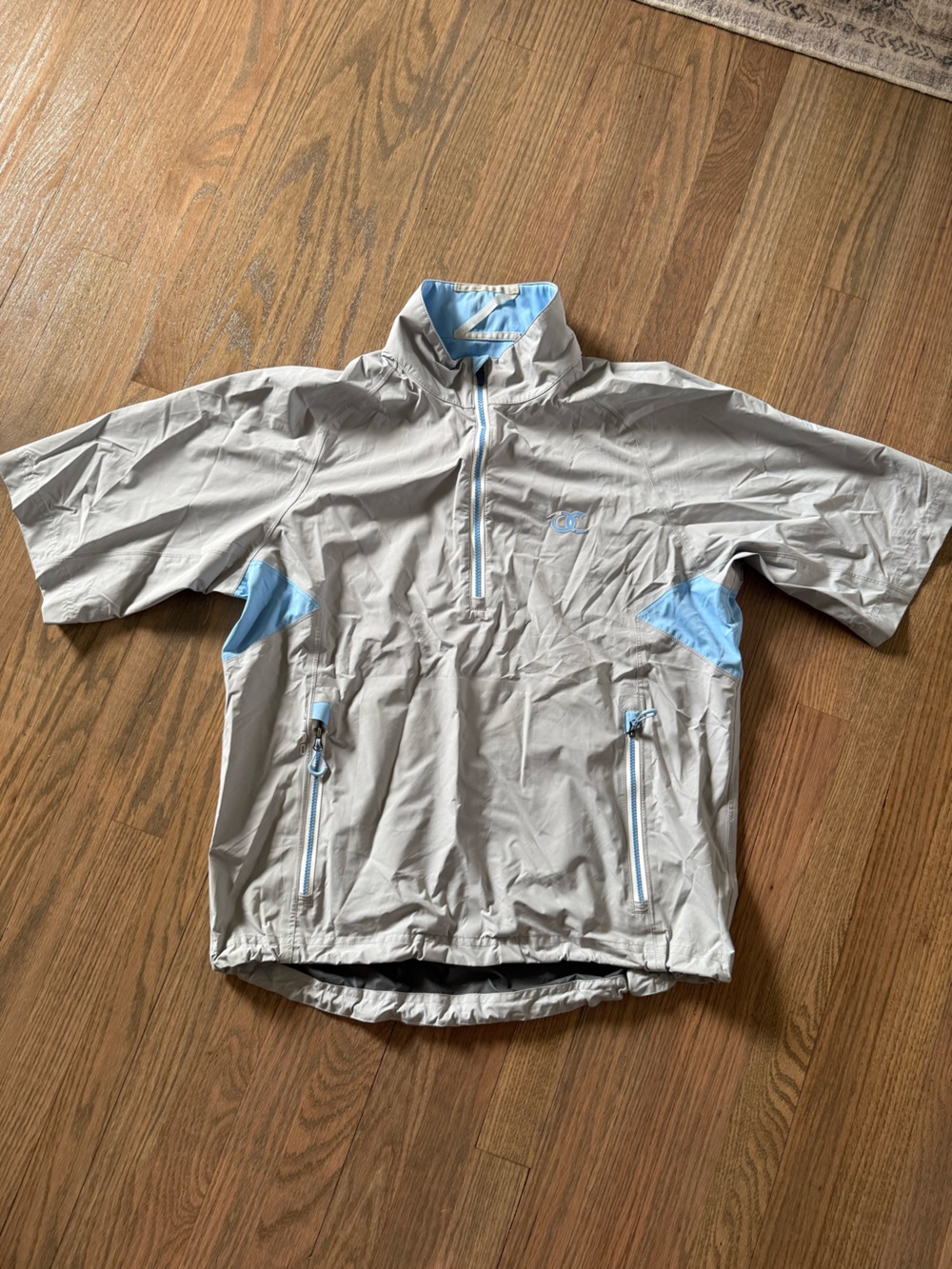 Light Gray Waterproof Jacket with Sky Blue Accents